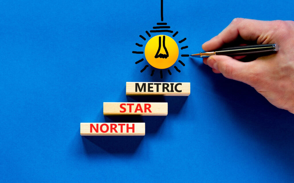 “North Star metric” written on wooden blocks | North Star metric examples