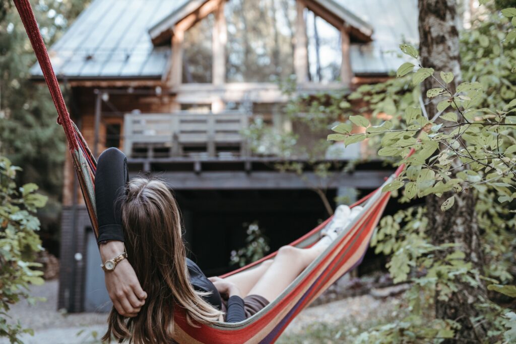 Woman in hammock | Airbnb’s North Star metric
